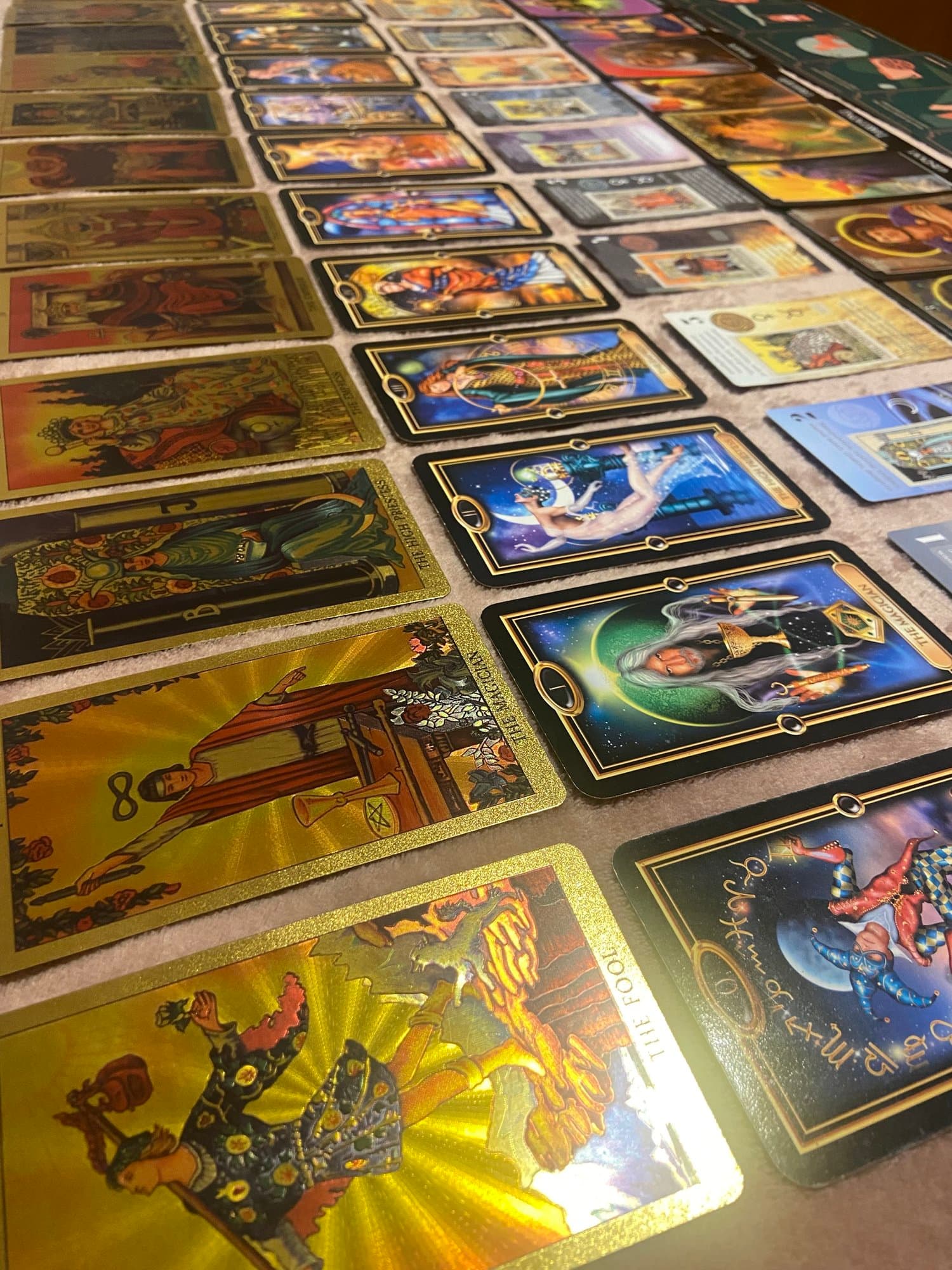 Nicole's tarot and oracle cards arranged for an intuitive reading