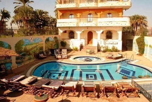 Pool, gardens and buildings at Leyla Eco Resort